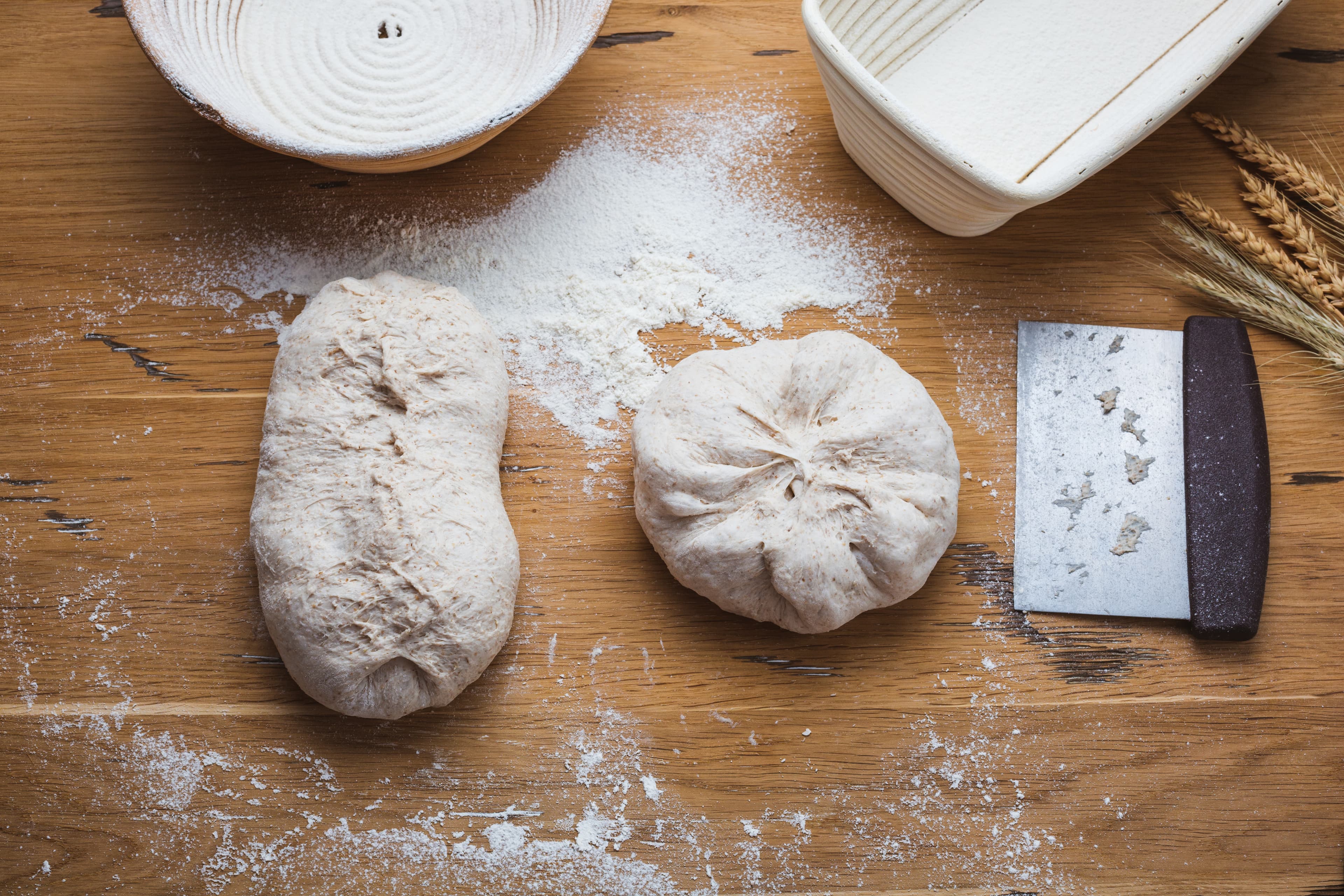 Fresh bread dough on a rustic wooden surface